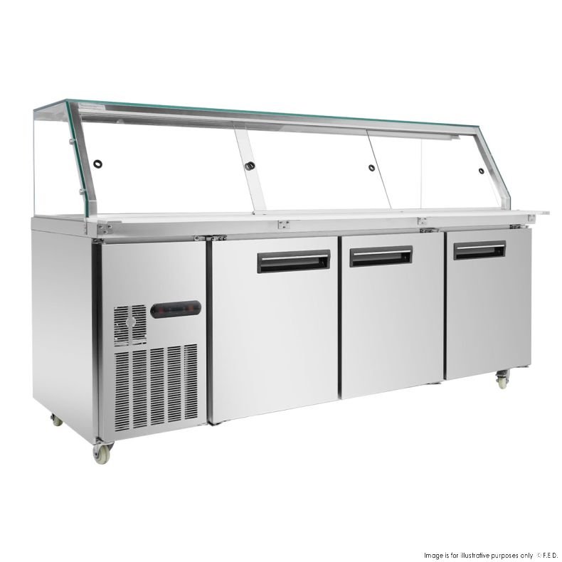 A commercial stainless steel refrigerated prep table with three doors, a glass sneeze guard, and caster wheels, designed for use in restaurants or food service establishments. MRCE