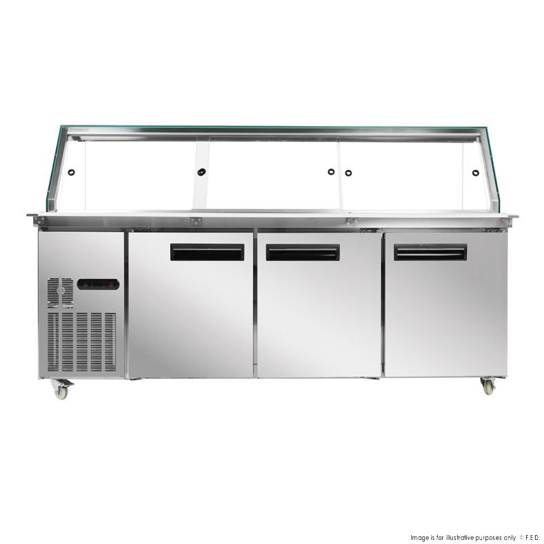 A large, stainless steel commercial salad bar refrigerator with a glass sneeze guard, three storage compartments, and ventilation on the left side. MRCE
